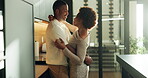 Dance, hug and talking with black couple in kitchen of home together for bonding or romance. Love, moment and trust with happy people embracing in apartment for connection or relationship security