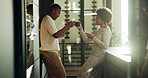 Cheers, coffee and smile with black couple in kitchen of home for bonding or connection. Conversation, drink and morning with happy people in apartment for break, communication or relationship goals