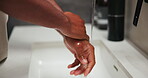 Basin, washing hands and water with person in bathroom for grooming, hygiene or skincare routine. Cleaning, health and wellness with man at sink in home to remove bacteria or germs for disinfection