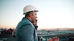 Architect, man and discussion in city with phone call, proposal or plan for urban development at sunset. Evening, bokeh and mature person outdoor with tech, contact and conversation for architecture.