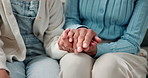 Holding hands, comfort and person with child on sofa for love, support and trust in relationship. Living room, home and grandmother with kid for bonding, compassion and care for family connection