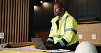 Laptop, renovation and thinking with black man in kitchen for home improvement or upgrade project. Computer, typing and writing with mature construction worker in modern apartment for property update
