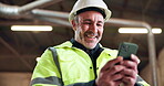 Happy, architect and man with phone on construction site, chat and communication with contact on web. Civil engineer, online and mature person with mobile, laugh and reading good news on social media