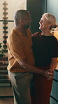 Dancing, kitchen and holding hands with happy couple in home for music, bonding or romance together. Interracial people, man and woman with partner, song or date for vibe, love or trust in house