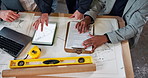 Architect, team and hands with tablet screen for construction planning or building design in office. Top view, group or civil engineer with technology display or blueprint for architecture project
