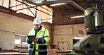 Serious, architect and man with tablet on construction site, walk and planning for renovation on web. Civil engineering, project management or mature person with tech, online and property development