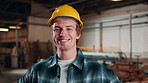 Carpentry, hardhat and man in factory with face, hazard protection and pride as timber craftsman. Happy, helmet or artisan with confidence, ppe compliance and about us in woodworking industry.