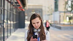 Serious, reading and woman with phone in city, internship application and notification for message. Networking, job site and person with tech for research in urban town, internet search or connection