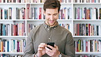Teacher, research and happy man with phone in library for academic study, knowledge or information. Male person, user or professor scrolling with smile on smartphone for online curriculum or syllabus