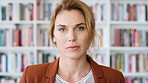 College, professor and face of woman in library for about us, course lecturer or knowledge. Education, academy researcher and bookshelf with person on campus for pride, teacher and university advisor