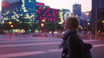 Thinking, university student or woman in city at night for commute, study inspiration or remember class. Evening, lesson reflection and scholar with smile for education, travel or bokeh in urban town