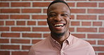 Face, laugh and black man on brick wall, business and career development with compliance consultant. Portrait, funny person or happy worker with ambition, about us or regulatory advisor on background