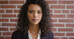 Face, about us and woman on brick wall, business and career development with compliance consultant. Portrait, person and employee with ambition, job opportunity and regulatory advisor with pride