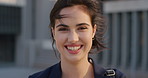 Face, student and woman in city with commute, smile and confidence for about us and learning. Portrait, female person and wind in town for campus travel, knowledge and education for morning college