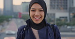 Face, funny and Muslim woman in street, business and travel for morning commute, laugh and smile. Happiness, employee and Islamic person in city, tradition and journey with professional in Istanbul