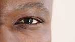 Person, vision and eye closeup with face for optometry test, optical health and ocular wellness. Eyesight, contact lenses and eyecare, visual assessment and space on white background in studio