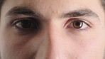 Face, eyes and man with pupil for optometry, perception and awareness for eyesight. Portrait, male person or retina closeup with peripheral vision, iris examination and optical care for visual health