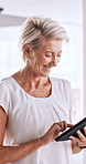 Broker, tablet and smile at office for review, insight or project proposal at insurance company. Mature woman, advisor and digital tech for feedback, typing and application at risk management agency