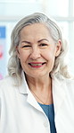 Face, doctor and mature woman in hospital with smile, medical expertise and healthcare professional. Portrait, happy or specialist with confidence for cardiology knowledge, health service or about us