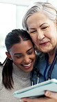 Hug, women and doctor with tablet in clinic for medical diagnosis, discussion or good news. Appointment, people and mature healthcare worker with tech for patient records, treatment and advice