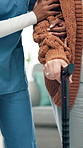 Hands, nurse or senior patient with cane for walking aid, healthcare or assistance in house. People, caregiver and assisted living with elderly care for mobility or rehabilitation in nursing home