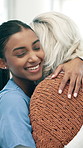 Woman, nurse and hug with senior in nursing home for healthcare, support or trust together. Female people, caregiver and embrace with smile for elderly care, love or thank you in retirement house