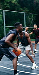 Men, dribble or team with goal on basketball court for sport competition, tournament or challenge. Active, male people or athletic players with offense or ball in net for score, outdoor game or match