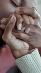 Hands, man and kiss at home with couple, affection and bonding together in living room. Closeup, people and compassion at house with love, romantic partner and healthy relationship for commitment