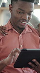Reading, tablet and couple with hug in home, browsing internet and support for relationship connection. Embrace, affection and black people with tech for movie subscription, watch series and smile