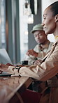 Happy, typing and black woman on laptop in coffee shop for research, online article and remote work. Freelancer, computer and person with ideas, inspiration and editing for blog review in cafeteria