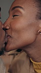 Love, trust or couple in cafe with kiss, partnership or bonding together in connection. Comfort, security or black people with affection, romantic moment or commitment in healthy relationship.