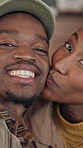 Cheek kiss, face or couple in cafe with love, partnership or bonding together in connection. Smile, portrait or black people with security, romantic moment or commitment in healthy relationship.