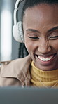 Woman, laugh and headphones in office with laptop, streaming music or funny trend for brand awareness. Happy, black person and audio tech in workplace with computer, song or online meme for marketing
