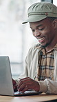 Man, typing and remote work in restaurant with laptop, creative project and editing article for blog. Freelance, writer or black person in cafe with computer, online research or planning for website.