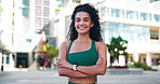 Face, athlete and woman with arms crossed outdoor for fitness, exercise and cardio for health. Portrait, runner and happiness in city with confidence, sports training and morning routine for wellness
