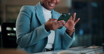 Smile, business and black woman with phone, typing and night for positive message. African person, evening and employee with digital tech, email notification and communication for funding approval