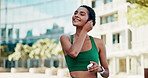 Earphones, athlete and woman in city with music, podcast or playlist for runner, exercise or wellness. Audio tech, fitness and female person listening to album or radio for cardio workout in town.
