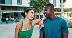 Fitness, interracial couple and laugh in city for funny joke, progress and support for wellness. Man, woman and athlete comedy in urban town for exercise, humor and happy for health and development