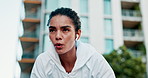 Tired, woman and fitness with sweat in city for workout break, rest or outdoor breathing exercise. Exhausted, female person or runner catching breathe for intense training, cooldown or recovery