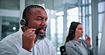 Call center, coworking and man in office on computer for financial consultant, advice or online help. Professional, finance and person with headset for customer support, communication and contact us