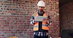 Tablet, man and confused at construction site with engineering app, space or online schedule. Asian person, technology and frustrated for project management, architecture or renovation of building