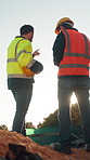 Planning, team or people with inspection at construction site, infrastructure discussion or evaluation. Property development, contractor or men with pointing for building check, low angle or back