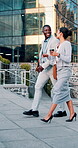 Happy, talking and business people in city walking to office for work, proposal update and finance team. Corporate, coffee and woman with man in discussion, chat and meeting for feedback in town
