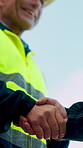Architect, team and shake hands for construction with collaboration, renovation or plan. Contractor, civil engineering or men in partnership for real estate, project management or onboarding outdoor