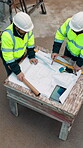Construction, planning and talking with people on building site for project management or review. Above, documents and floor plan with men outdoor for architecture, property development or teamwork