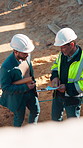 Construction, team and engineer planning with checklist, building development or blueprint review. Architect, talk and men outdoor with clipboard, strategy or project schedule at site from above