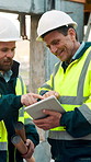 Engineer, team and planning at construction site with tablet, online research and project collaboration. People, smile and talk outdoor with tech, engineering design review and infrastructure advice.