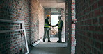 Construction, handshake or men on site with deal, greeting or approval of building project. Intro, ppe or engineers with shaking hands, collaboration agreement or cooperation in industrial planning.
