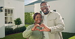 Happy couple, face and heart at house, backyard and bonding with partner on weekend and love symbol. Black people, home and laughing with spouse on break, support and hand gesture for shape outdoor