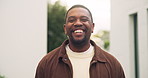 Real estate, laughing and face of black man outdoor for residential property, smile and excited. Achievement, portrait and homeowner with happiness for moving in, purchase and new house investment